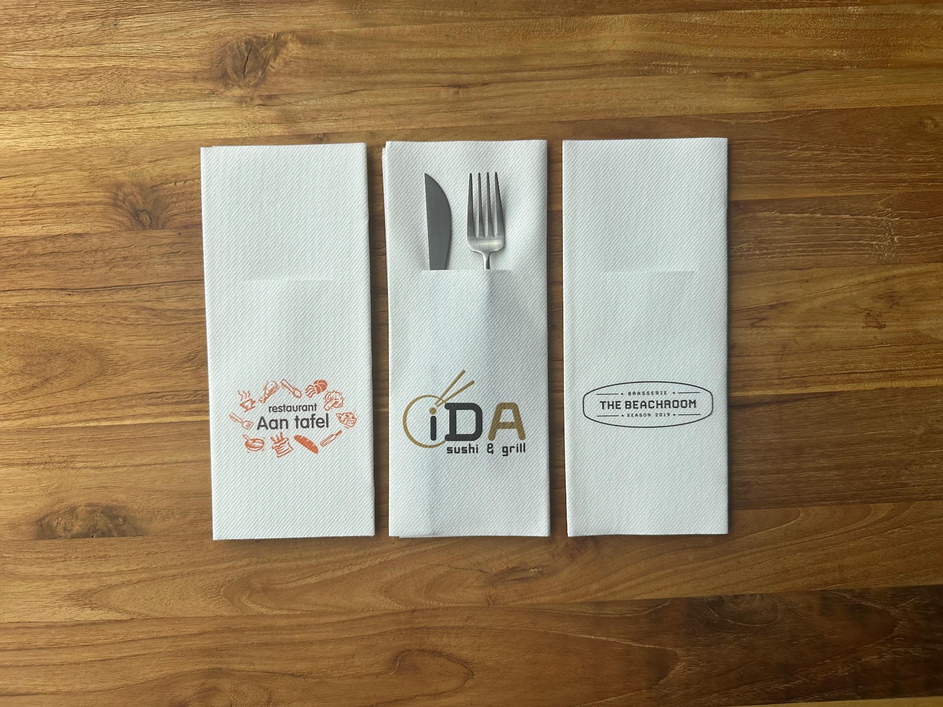 PocketServet®ten met logo's van Aan tafel, IDA en The Beachroom